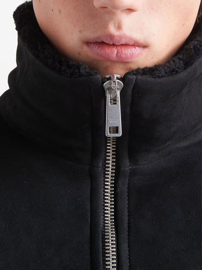 logo-patch shearling zip-up jacket