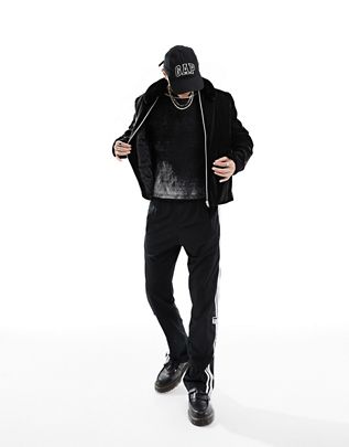 faux leather jacket with faux fur collar in black